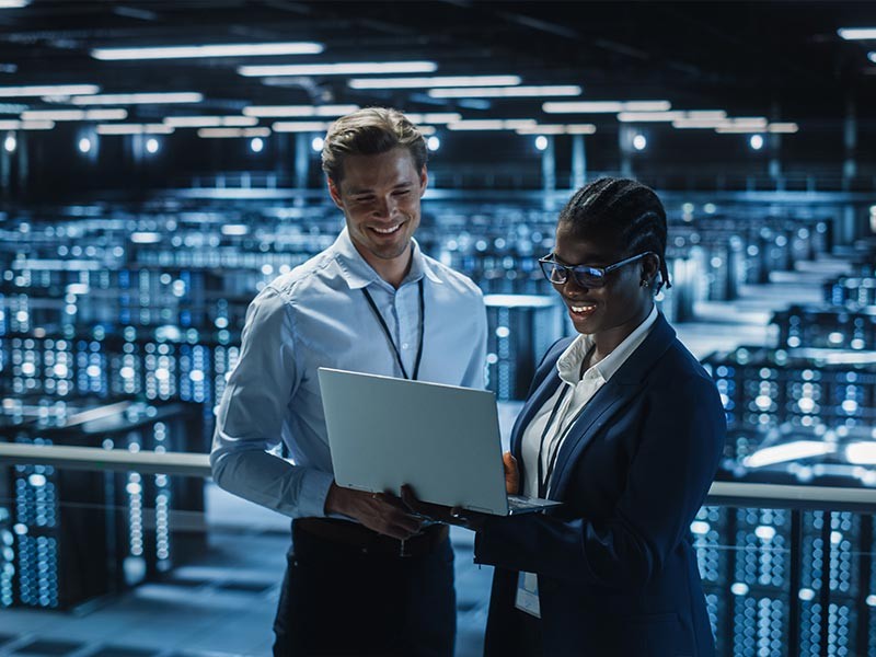 A people working in a server room