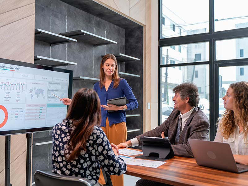 Woman presenting in a meeting room