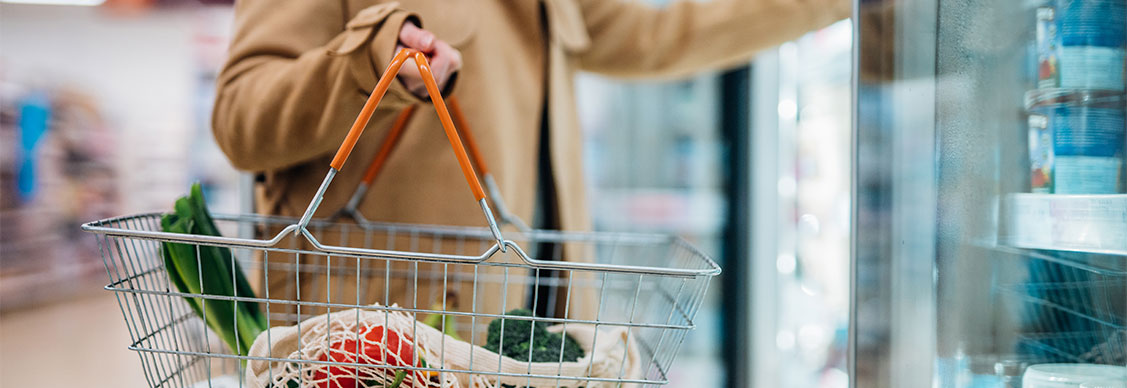 Women purchasing at a supermarket