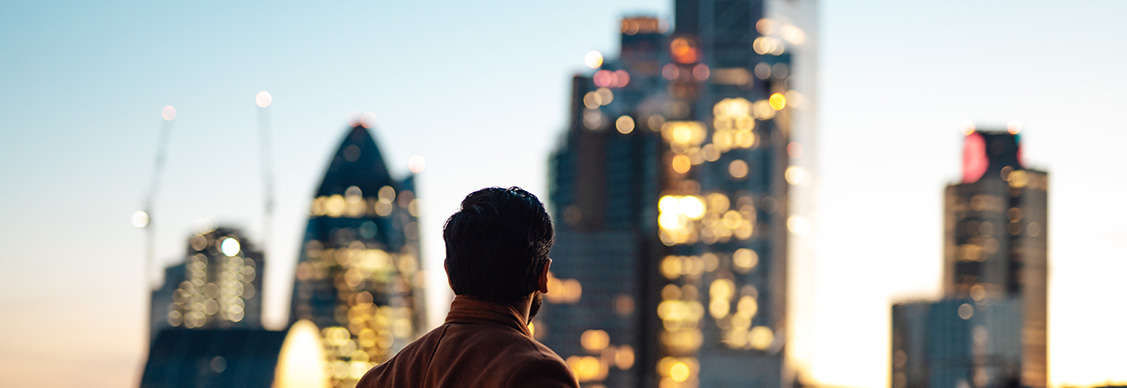 A man looking something while standing